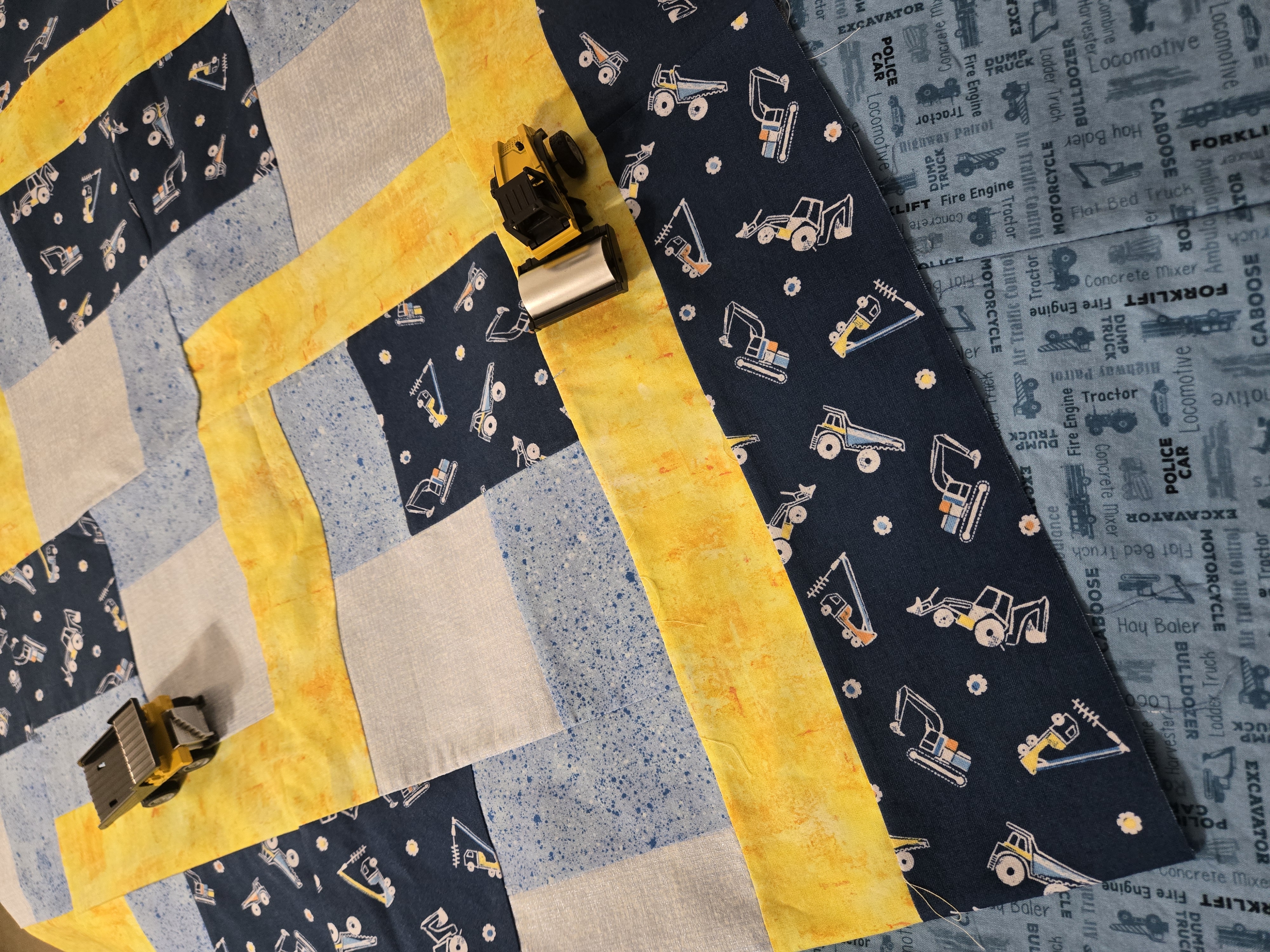 Truck with yellow brick roads quilt